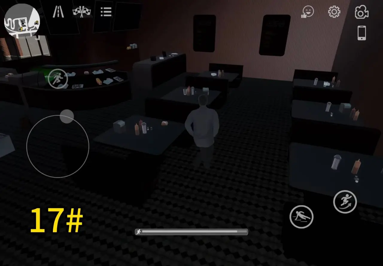Dark diner interior with booths where the green gift box sits